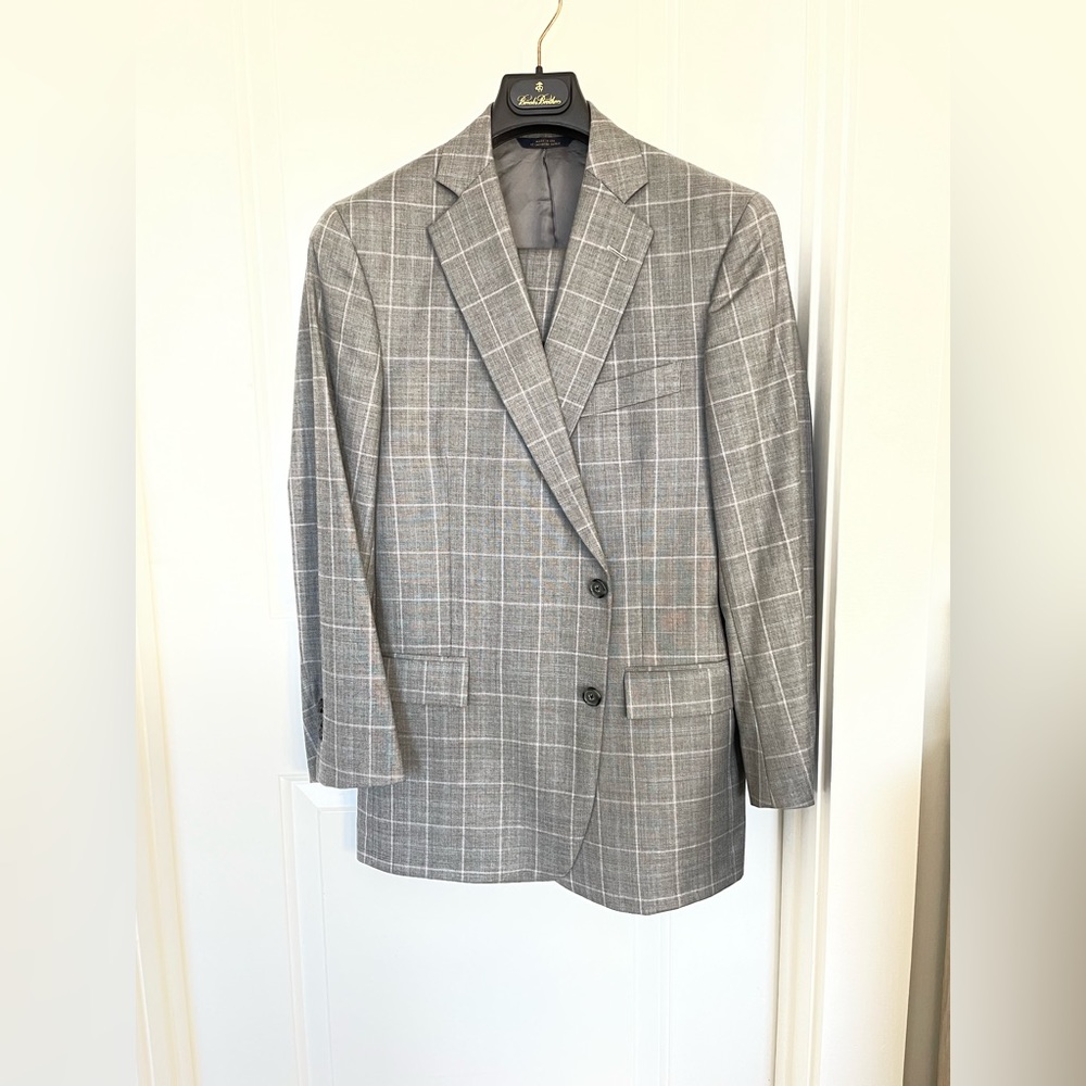 Brooks Brothers suit, grey windowpane with white and light blue highlights.